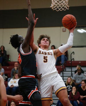 Ankeny senior Ryan Crandall drives to the basket in the third quarter against West Des Moines Valley on Tuesday, Dec. 7, 2021, at Ankeny High School.