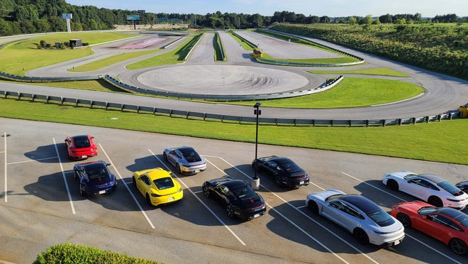 The Porsche Experience in Atlanta is concentrated around a 1.5-mile track that envelopes a complex of skid pad, wet-skid pad, slalom course, and off-road course. 