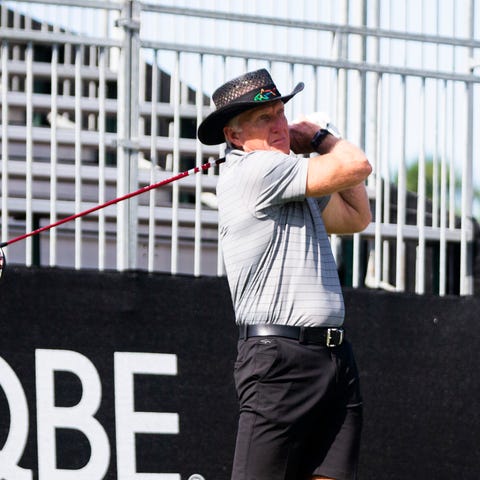 Greg Norman takes a swing during the QBE Shootout 