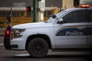 Phoenix Police has detained a man for questioning in the July 23, 2021 fatal shooting of a man off West Indian School Road. A Phoenix PD vehicle in this December 2021 file photo.
