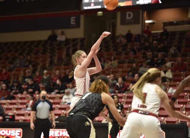 Darri Dotson converts on an and-one early in the first quarter against Colorado. The senior had 16 points to lead the Thunderbirds in the loss.