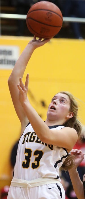 Cuyahoga Falls' Ellie Brustoski shoots against Kent-Roosevelt in the first half of their girls basketball game at Cuyahoga Falls High School.
