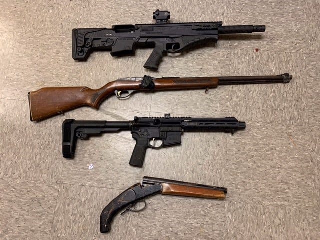 Iberville Parish authorities released a photo of firearms seized in the investigation.