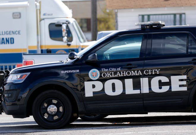 In this file image, an Oklahoma City police unit is parked outside of police headquarters in downtown Oklahoma City in March 2020.