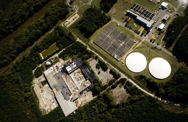 This photo shows the former Texfi plant (lower left), and Fayetteville's Hoffer Water Treatment Facility (upper right) and the Cape Fear River (upper left). Dangerous chemicals are in the groundwater underneath the Texfi plant and the water treatment plant, and are spreading toward the river.