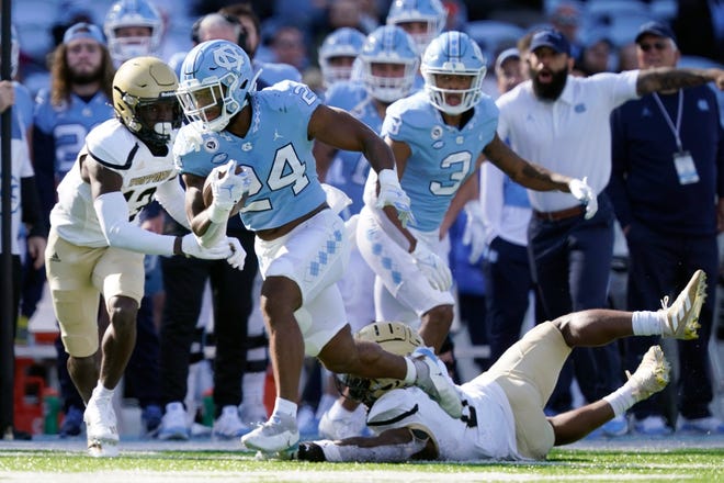 British Brooks runs for a 38-yard touchdown during North Carolina’s victory against Wofford last month.