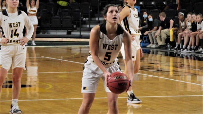 Audrey Tingle surpassed the 1,0000-point plateau for West Liberty Saturday.