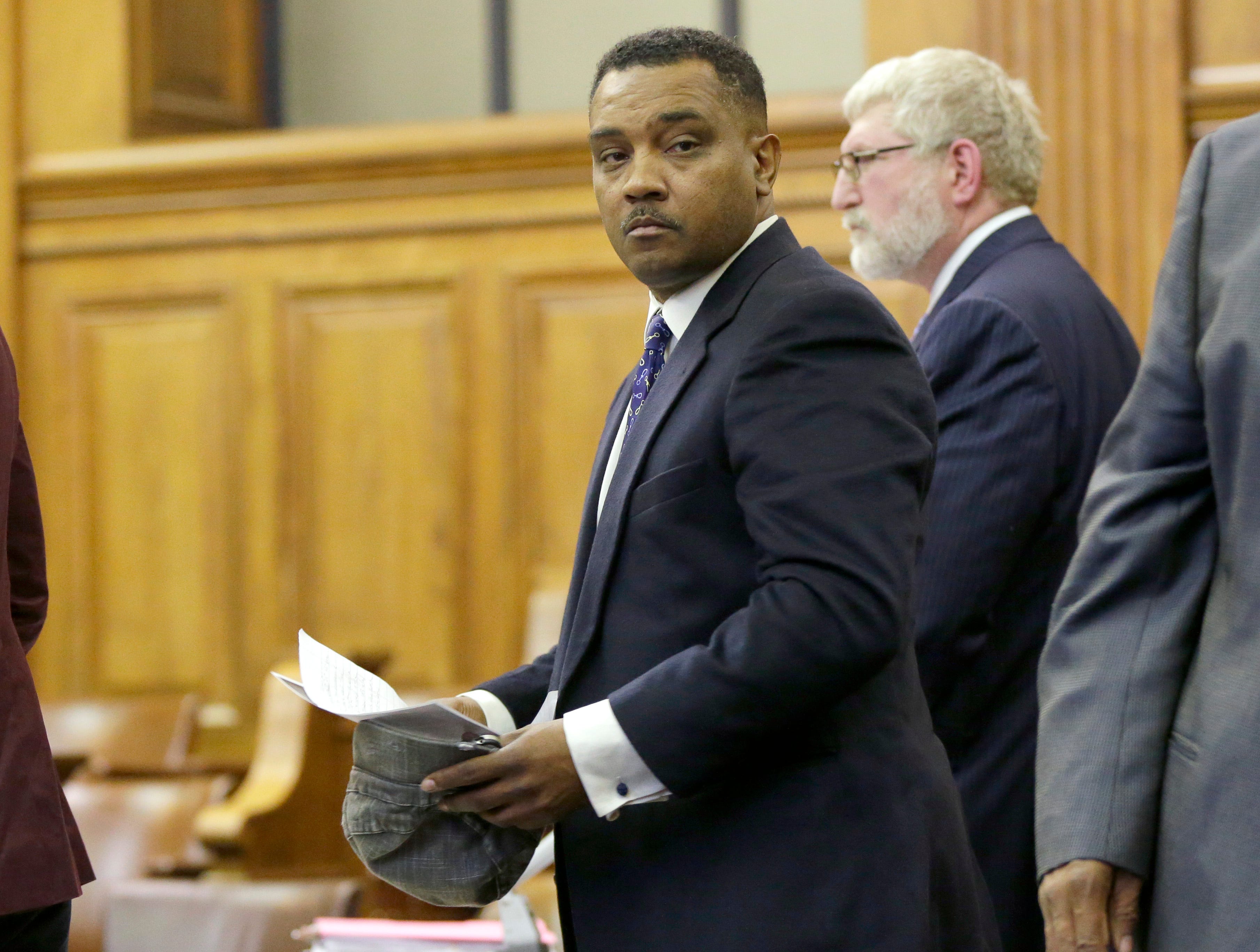 Landlord Elijah Mohammad Rashaed, left, pictured in 2017. Disrepair in the 150-plus properties linked to Rashaed overwhelmed court-appointed property managers.