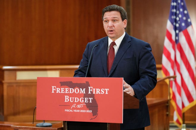Governor Ron DeSantis announces his draft state budget for 2022-23 on Capitol Hill on December 9, 2021.
