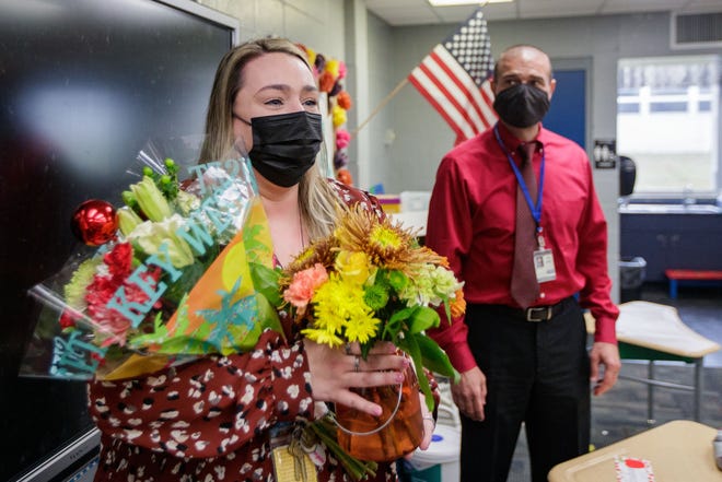 Ashlyn Laughlin, a teacher at Pineview Elementary School, celebrates being named Leon County Schools' Teacher of the Year Thursday, Dec. 9, 2021.