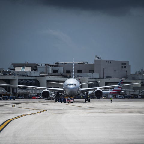 An American Airlines plane prepares to takes off f