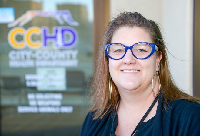 Outgoing Health Officer for the City County Health Department Trisha Gardner smiles outside CCHD in Downtown Great Falls.