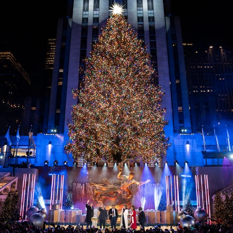 The Rockefeller Center Christmas tree stands lit a
