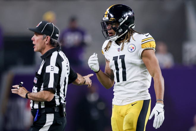 Pittsburgh Steelers wide receiver Chase Claypool (11) reacts to a penalty during the first half of an NFL football game against the Minnesota Vikings, Thursday, Dec. 9, 2021 in Minneapolis. Minnesota won 36-28. (AP Photo/Stacy Bengs)