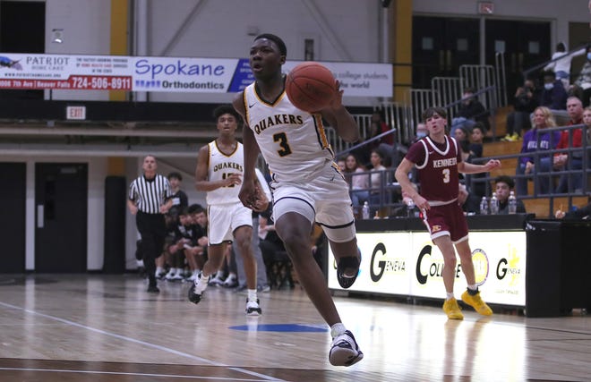 Quaker Valley's Adou Thiero (3) drives to the basket during the first half of the Midland Tip-off Tournament game against Kennedy Catholic on Friday, Dec. 10, at Metheny Field House on Geneva College's campus.