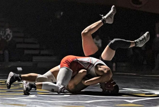Oak Hills’ Julian Jeong scored a pinfall victory over Hesperia’s Jonathan Gamez in the 152-pound match during Thursday night’s dual meet. The Bulldogs topped the Scorpions by a score of 42-35.