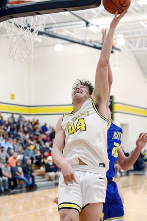 Erik Neal, of Tri-Valley goes up for a shot in the lane against Maysville on Friday night in Dresden. Tri-Valley won, 70-52, to stay unbeaten.