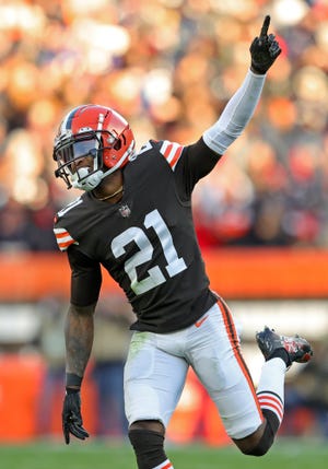 Browns cornerback Denzel Ward celebrates after making a fourth-down stop to seal the win against the Ravens during the fourth quarter Sunday, Dec. 12, 2021, in Cleveland.