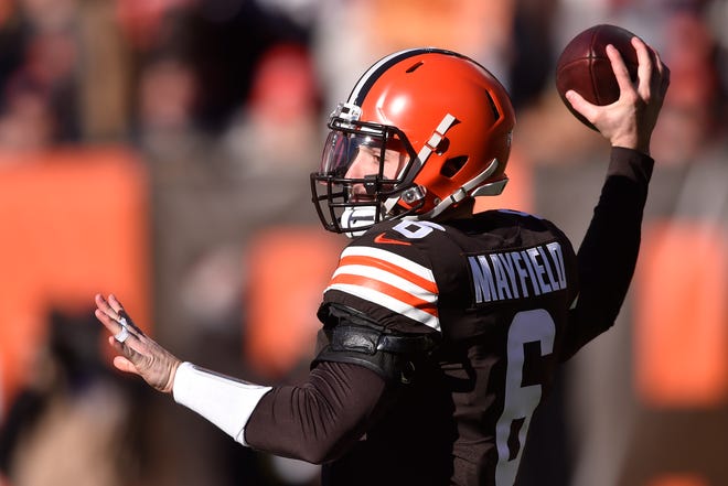 Cleveland Browns quarterback Baker Mayfield throws during the first half of an NFL football game against the Baltimore Ravens, Sunday, Dec. 12, 2021, in Cleveland. (AP Photo/David Richard)