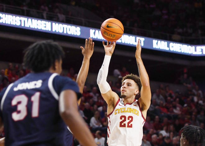 Iowa State guard Gabe Kalscheur (22) takes a shot over Jackson State's forward Jamarcus Jones  during the first half at Hilton Coliseum Sunday, Dec. 12, 2021, in Ames, Iowa