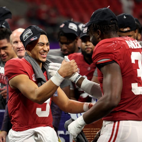 Heisman Trophy winner Bryce Young celebrates with 