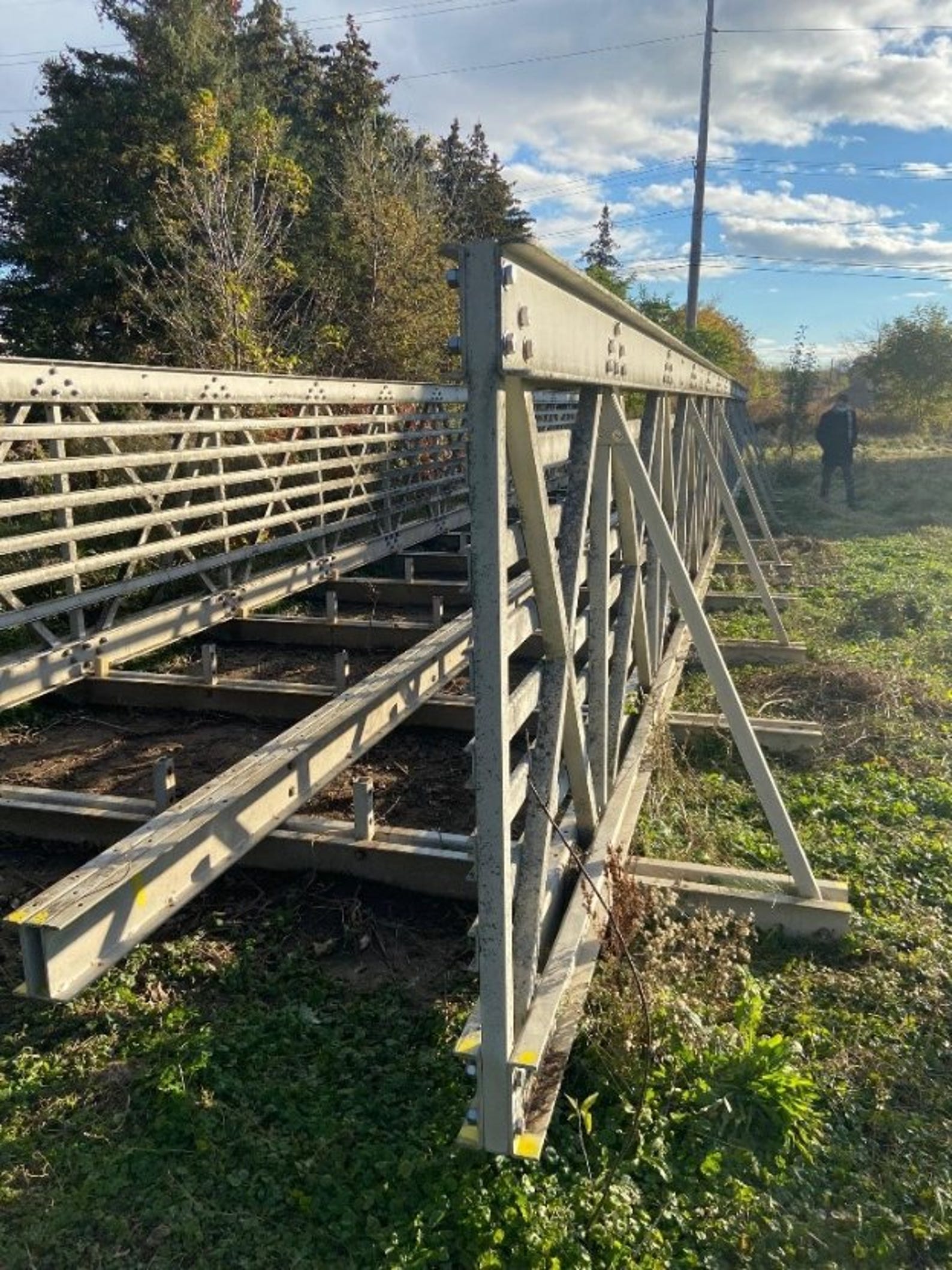 On Nov. 3, police said the city discovered someone had cleared brush from around this bridge, and took the treated wood deck boards.