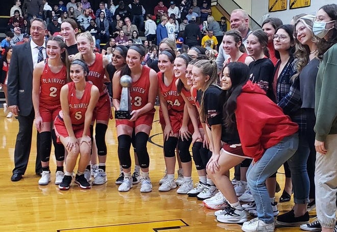 The Plainview girls basketball team poses for a photo after winning the Madill Winter Classic on Saturday with a 62-50 win over Marietta.