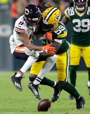 Green Bay Packers inside linebacker De'Vondre Campbell (59) breaks up a pass intended for Chicago Bears wide receiver Darnell Mooney (11) in the second quarter during their football game Sunday, December 12, 2021, at Lambeau Field in Green Bay, Wis. Dan Powers/USA TODAY NETWORK-Wisconsin