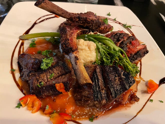 The Hunter's Platter at Seasons 101 includes venison medallions, walnut-encrusted lamb, and clove- and shallot-scented duck served in a hunter’s sauce with horseradish mashed potatoes.