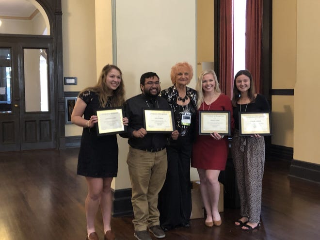 Southeastern University students Cassie Cullen, John Pokhan and Daria Castor with Fanchon “Fancy” Funk and Natalie Genton, winner from Florida State University, at the FATE conference, left to right.