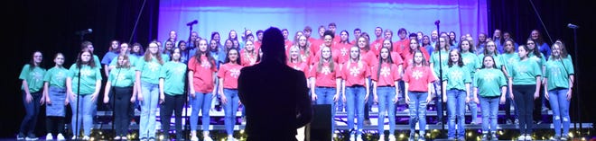 Joyful Christmas songs and sounds filled the air as the Owen Valley High School and Middle School choirs performed their annual holiday concert, "Sounds of the Season" recently. Valley Soundwaves, Sweet Pizzazz and Patriot Singers are shown as they perform 'Carol of the Bells.' More photos from both the choir and band concerts will be featured in the upcoming editions of the SEW.