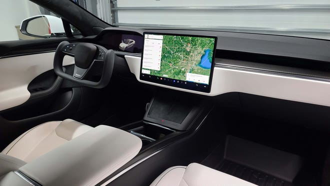 The simplified interior of the 2022 Tesla Model S Plaid takes its cues from the Model 3.