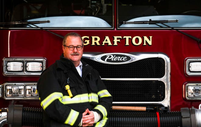 Grafton Fire Chief William Rice poses for a portrait Tuesday, Dec. 14, 2021, at Grafton Village Fire Department in Grafton, Wis. Chief Rice has been the chief for eight years.
