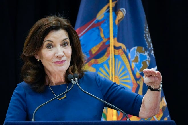 New York Gov. Kathy Hochul speaks at an event, Friday, Dec. 10, 2021, in New York. Hochul announced that masks will be required in all indoor public places in New York State unless the businesses or venues implement a vaccine requirement.