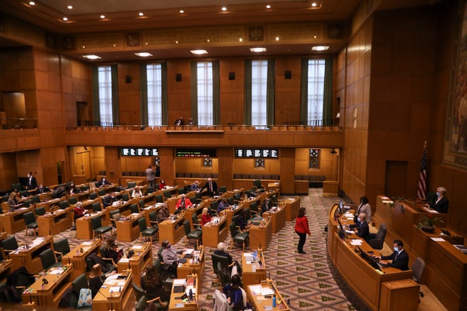 The House convenes for the second special session at the Oregon State Capitol Building in Salem, Ore. on Monday, Dec. 13, 2021. 
