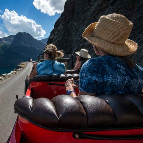 Historic red buses, operated by Glacier National P