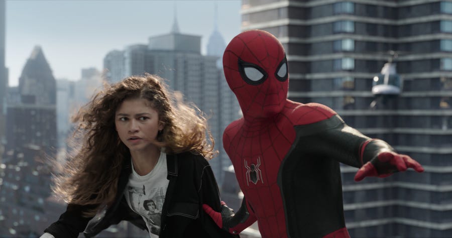 MJ (Zendaya) and Spider-Man (Tom Holland) are surrounded by unwanted media attention in "Spider-Man: No Way Home."