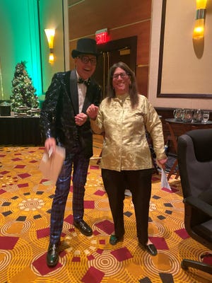 Host Brian Wanzek poses with Well in the Desert President Arlene Rosenthal at Desert Jam 2021 on Monday, Dec. 6, 2021.