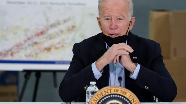 President Joe Biden attends a briefing on the stor