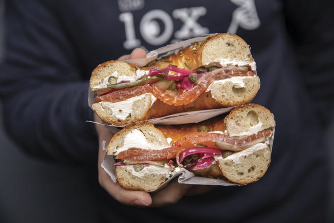 The Lox sandwich on a sea salt and herb bagel at The Lox Bagel Shop, which has reopened for dine-in.