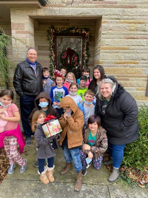Last week Wynford second graders came caroling to the Minors accompanied by Elementary Principal Dave Danhoff, parent Amanda Veith and Eden Smock.
