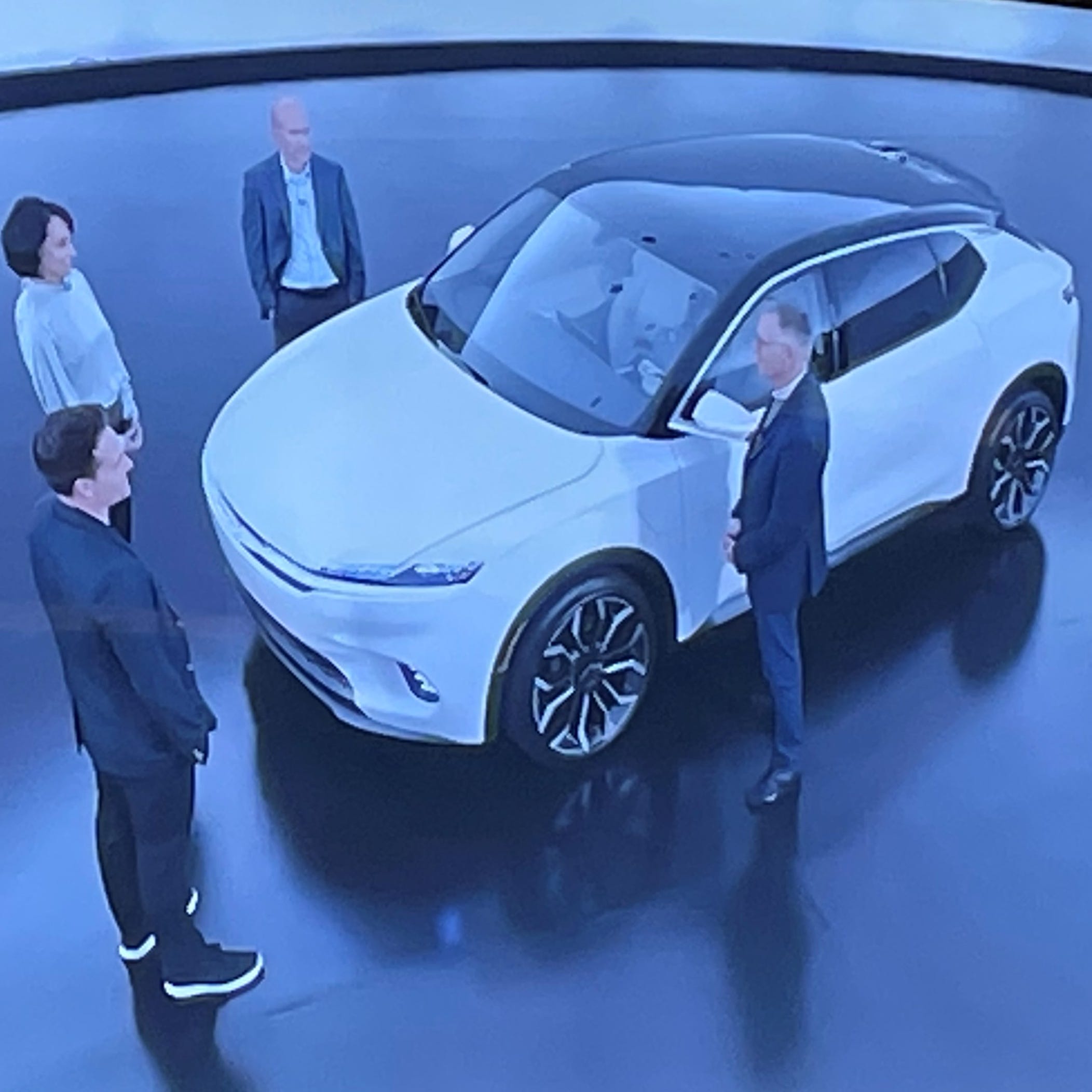 Stellantis CEO Carlos Tavares, right, in a video shown during the company's Software Day presentation in December, discusses the Airflow, a vehicle that could lead the next chapter for the Chrysler brand.