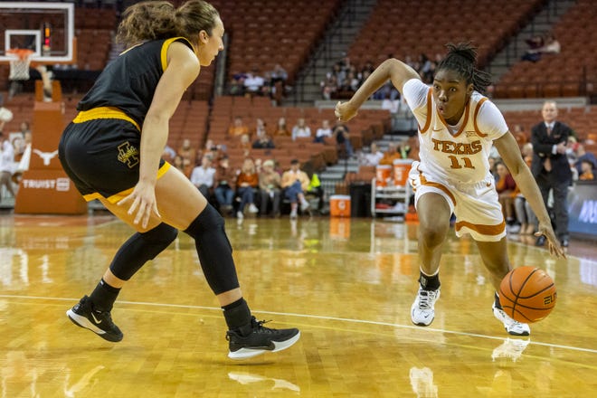 Texas guard Joanne Allen-Taylor looks to drive around Idaho point guard Beyonce Bea during their game at the Erwin Center on Dec. 11. The Longhorns will play No. 4 Arizona in Las Vegas on Sunday.