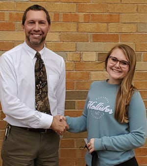 Mr. Christopher Siders, NHS Advisor, is pictured with Jocee Miller, Canton High School’s December Senior of the Month.