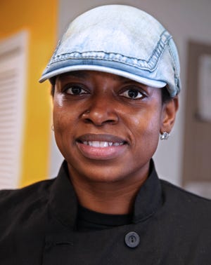 Tomira White, owner of Delicious Bites, is shown at Upstart Kitchen in December. White is one of the site's successes: She plans to open her own retail space at 6538 W. North Ave. in Wauwatosa in January.