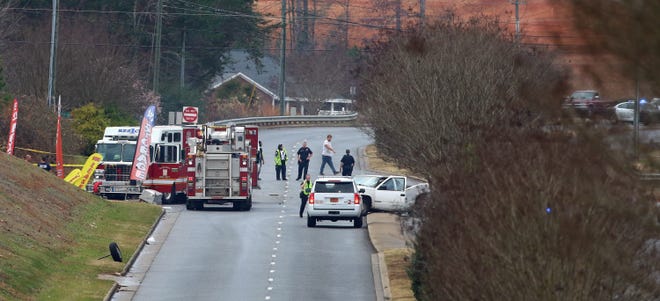 Scene of a fatal wreck at the intersection of East Hudson Blvd. and Forbes Road Saturday afternoon, Dec. 18, 2021.