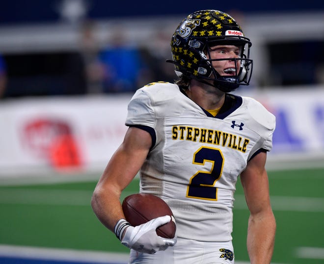 Stephenville wide receiver Coy Eakin smiles after scoring a touchdown against Austin LBJ during Friday's Class 4A Div. I state championship game in Arlington.