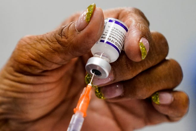 Pengadilan mengizinkan mandat vaksin pemberi kerja Biden berlaku