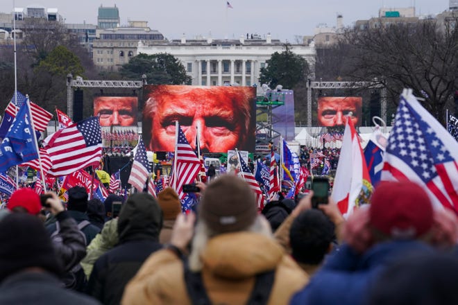 President Donald Trump urges supporters to march to the Capitol at a rally on Jan. 6, 2021, in Washington.