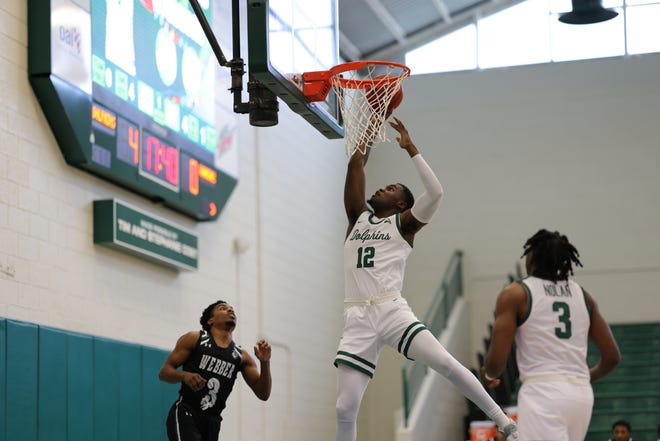 Mike Marsh of Jacksonville University goes up for a basket during Saturday's victory over Webber.